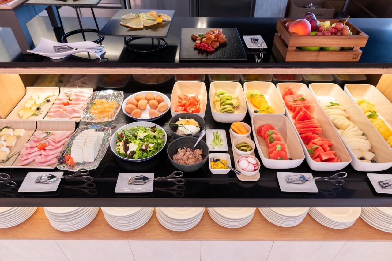 Eurostars Portico Αλικάντε Εξωτερικό φωτογραφία A buffet at a hotel