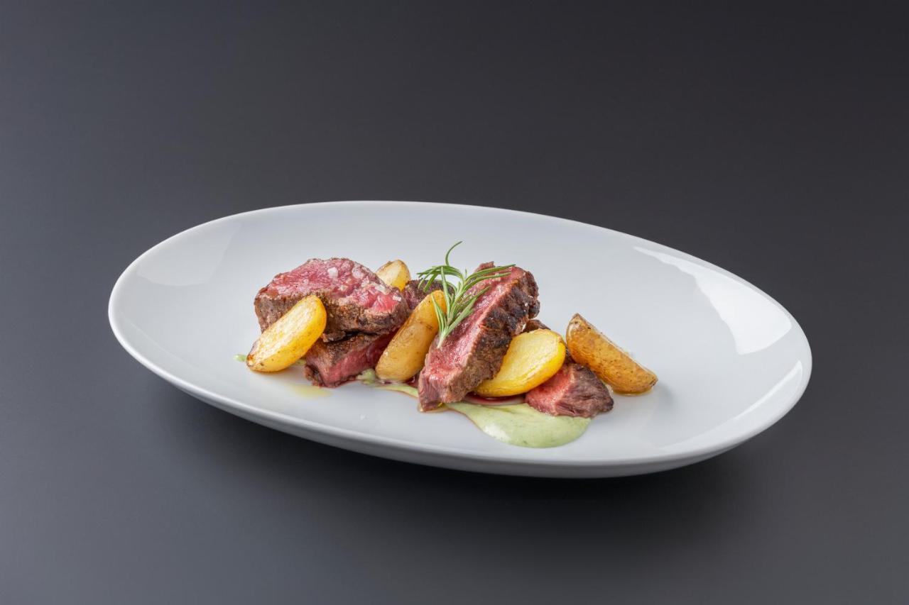 Eurostars Portico Αλικάντε Εξωτερικό φωτογραφία A steak with potatoes